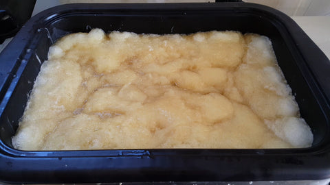 The Mod Cabin soap mixture bubbling while cooking in a roaster.